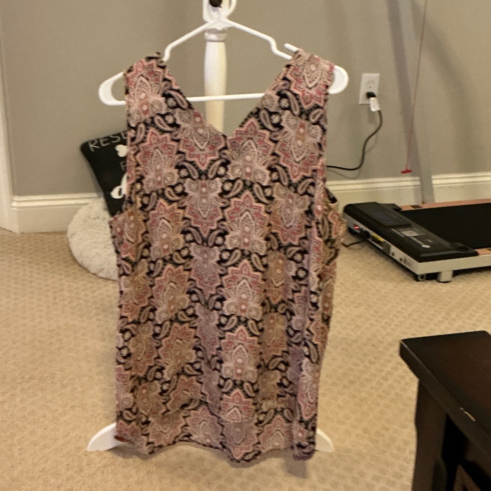 Maurice’s paisley tank with open back detail.
